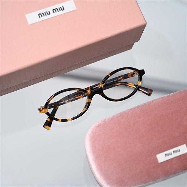 MiuMiu Glasses 0MU04ZS VAU08N